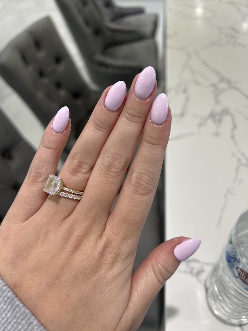 Elegant soft pink almond-shaped gel nails