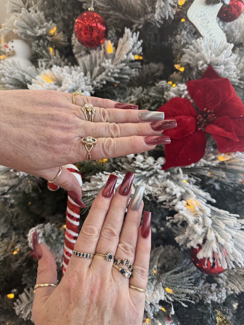Holiday-themed red and candy cane nail designs